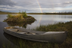 A rainbow breaks after a storm in the backcountry of Alaska.